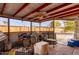 Covered patio area with plenty of space for storage at 10126 W Sun City Blvd, Sun City, AZ 85351