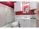 Simple bathroom with a tub, toilet and sink at 10126 W Sun City Blvd, Sun City, AZ 85351