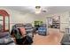 Living room with hardwood floors and comfy seating at 10126 W Sun City Blvd, Sun City, AZ 85351