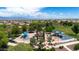 Aerial view of a community park with playground equipment and shaded areas at 11050 E Ravenna Ave, Mesa, AZ 85212