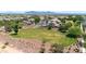 Community overview featuring homes, green spaces, and mountain views at 11050 E Ravenna Ave, Mesa, AZ 85212