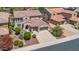 Two-story house with a two-car garage and manicured lawn at 11050 E Ravenna Ave, Mesa, AZ 85212