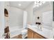 Simple bathroom with tub, toilet, and vanity at 11050 E Ravenna Ave, Mesa, AZ 85212