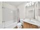 Clean bathroom with a shower/tub combo at 11050 E Ravenna Ave, Mesa, AZ 85212