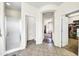 Bathroom with shower, toilet and access to other rooms at 11050 E Ravenna Ave, Mesa, AZ 85212