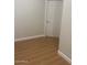 Bedroom with wood-look flooring and neutral wall color at 11050 E Ravenna Ave, Mesa, AZ 85212