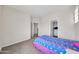 Small bedroom with a closet and window at 11050 E Ravenna Ave, Mesa, AZ 85212