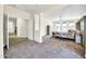Spacious bedroom with carpeted floors and large windows at 11050 E Ravenna Ave, Mesa, AZ 85212