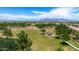 Large community park with walking paths and ramadas at 11050 E Ravenna Ave, Mesa, AZ 85212