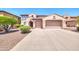 Two-story house with a two-car garage and front landscaping at 11050 E Ravenna Ave, Mesa, AZ 85212