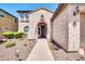 Front entry with walkway and decorative landscaping at 11050 E Ravenna Ave, Mesa, AZ 85212