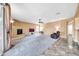Spacious living room featuring a fireplace and ample natural light at 11050 E Ravenna Ave, Mesa, AZ 85212