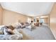 Comfortable living room with a view into the dining area at 11050 E Ravenna Ave, Mesa, AZ 85212