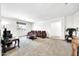 Spacious loft with seating area, great for a secondary living space at 11050 E Ravenna Ave, Mesa, AZ 85212