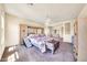 Large main bedroom with plenty of space for furniture and natural light at 11050 E Ravenna Ave, Mesa, AZ 85212
