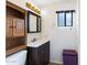 Clean bathroom with vanity, medicine cabinet, and toilet at 111 S Greenfield Rd # 488, Mesa, AZ 85206