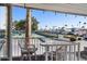 Relaxing patio furniture overlooking a tennis court at 111 S Greenfield Rd # 488, Mesa, AZ 85206