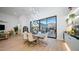 Modern dining area with large windows and mountain view at 14141 E Highland Ave, Fountain Hills, AZ 85268