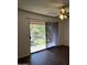 Bedroom with sliding glass doors to balcony with decorative ironwork at 1550 N Stapley Dr # 35, Mesa, AZ 85203