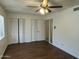 Generous bedroom with double closets and wood floors at 1550 N Stapley Dr # 35, Mesa, AZ 85203