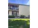 Inviting condo exterior with well-manicured lawn and balcony at 1550 N Stapley Dr # 35, Mesa, AZ 85203