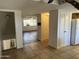 Open floor plan offers an eat-in kitchen with tile flooring and access to downstairs at 1550 N Stapley Dr # 35, Mesa, AZ 85203