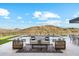 Resort-style backyard features pool, mountain views, and multiple seating areas at 15609 E Palatial Estates Dr, Fountain Hills, AZ 85268
