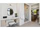 Modern bathroom boasts vanity with decorative mirror and marble walk-in shower at 15609 E Palatial Estates Dr, Fountain Hills, AZ 85268