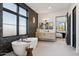This bright bathroom features a free standing tub and stylish vanity at 15609 E Palatial Estates Dr, Fountain Hills, AZ 85268