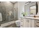 Modern bathroom featuring a tiled shower with glass door, sleek vanity, and contemporary finishes at 15609 E Palatial Estates Dr, Fountain Hills, AZ 85268