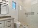 Modern bathroom with a walk-in shower and gray vanity at 15609 E Palatial Estates Dr, Fountain Hills, AZ 85268