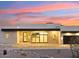 Contemporary home showcasing architectural details and sunset views at 15609 E Palatial Estates Dr, Fountain Hills, AZ 85268