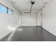Spacious two-car garage with epoxy flooring and high ceilings at 15609 E Palatial Estates Dr, Fountain Hills, AZ 85268