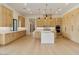 Modern kitchen with light wood cabinets, large island, and high-end appliances at 15609 E Palatial Estates Dr, Fountain Hills, AZ 85268