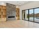 Living room with fireplace, built-in shelving, and mountain views at 15609 E Palatial Estates Dr, Fountain Hills, AZ 85268