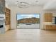 Spacious living room with sliding doors leading to a pool and mountain views at 15609 E Palatial Estates Dr, Fountain Hills, AZ 85268