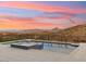 Expansive pool and spa with sunset views at 15609 E Palatial Estates Dr, Fountain Hills, AZ 85268
