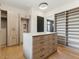 Large walk-in closet with ample shelving and drawers at 15609 E Palatial Estates Dr, Fountain Hills, AZ 85268