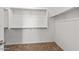 Spacious walk-in closet with ample shelving and hanging space at 16115 W Vale Dr, Goodyear, AZ 85395