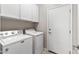 Convenient laundry room with Maytag washer and dryer at 16115 W Vale Dr, Goodyear, AZ 85395