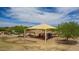 A playground with shade covering, slides, swings and more for children of all ages to enjoy at 18014 N 63Rd Ln, Glendale, AZ 85308