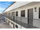 Exterior view of apartment building with walkway and railings at 18202 N Cave Creek Rd # 241, Phoenix, AZ 85032