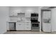 Modern kitchen with stainless steel appliances and white cabinets at 18202 N Cave Creek Rd # 241, Phoenix, AZ 85032