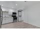 Modern kitchen with stainless steel appliances and white cabinets at 18202 N Cave Creek Rd # 241, Phoenix, AZ 85032