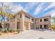 Beautiful multi-level home with stone accents, desert landscaping, and a private two-car garage at 19700 N 76Th St # 2072, Scottsdale, AZ 85255