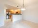Open kitchen area with stainless steel appliances and breakfast bar, adjacent to the dining area at 19700 N 76Th St # 2072, Scottsdale, AZ 85255