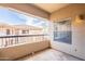Outdoor patio with railing overlooking manicured common area at 19700 N 76Th St # 2072, Scottsdale, AZ 85255