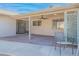 Relaxing covered patio with brick flooring and ceiling fan at 2016 E Pegasus Dr, Tempe, AZ 85283