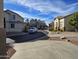 Community view showing homes with a curved street at 2215 S Harper --, Mesa, AZ 85209