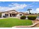 Expansive backyard featuring green lawn, pool area, and covered patio, perfect for outdoor entertaining at 22415 N 34Th Ln, Phoenix, AZ 85027